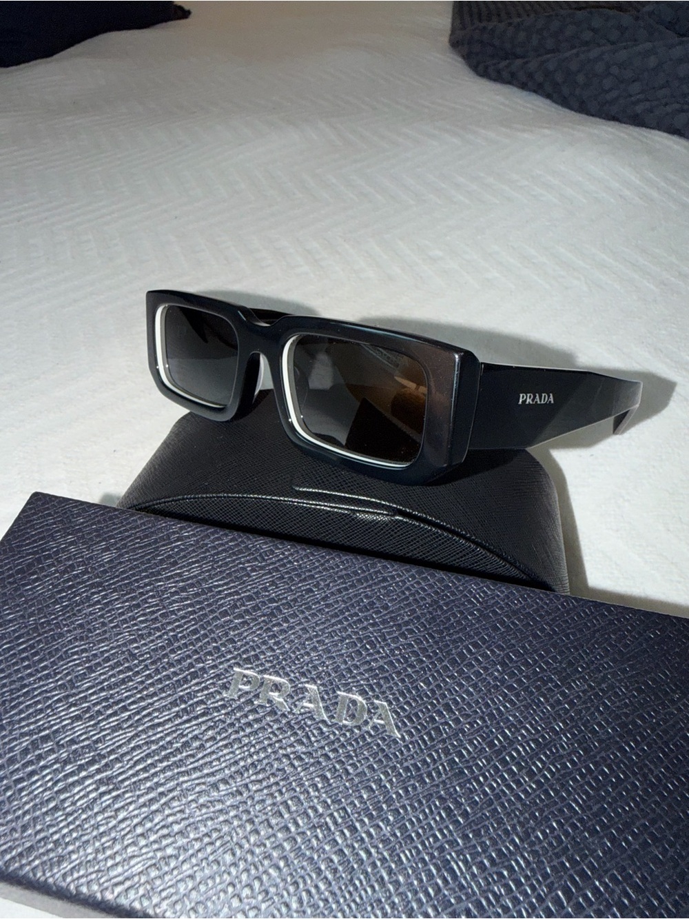 Prada Black Rectangular Sunglasses with White Inner Trim